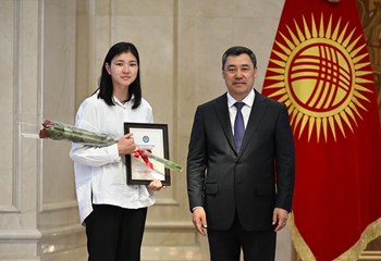 President of the Kyrgyz Republic Awards Prestigious Gold Certificate of National Test to SPCE Graduate
